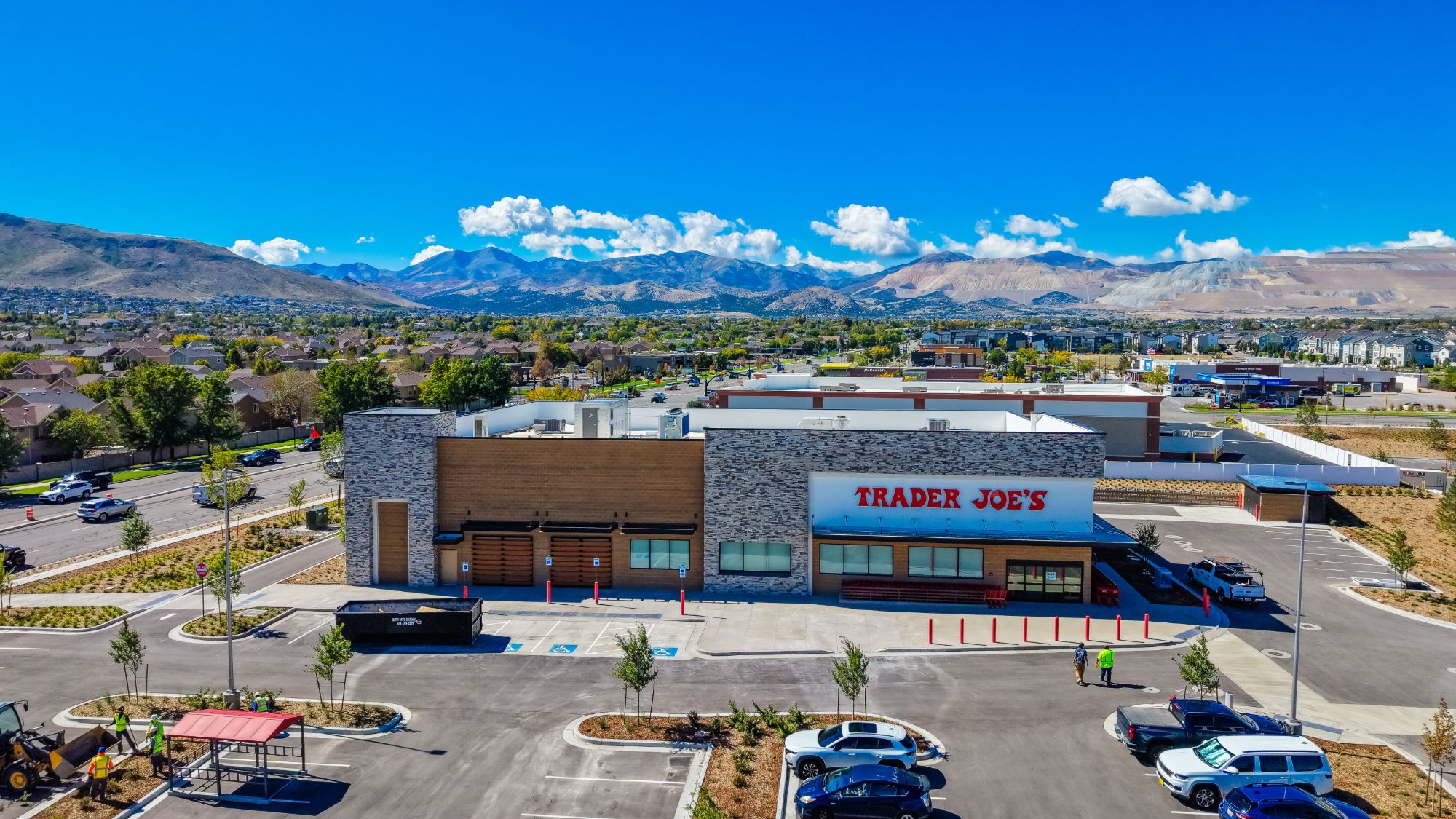 The Trader Joe's storefront at The Commons with the mountains behind